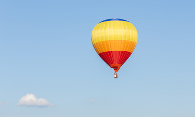 Colorful hot air balloon on blue sky