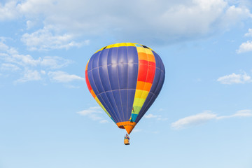Colorful hot air balloon on blue sky