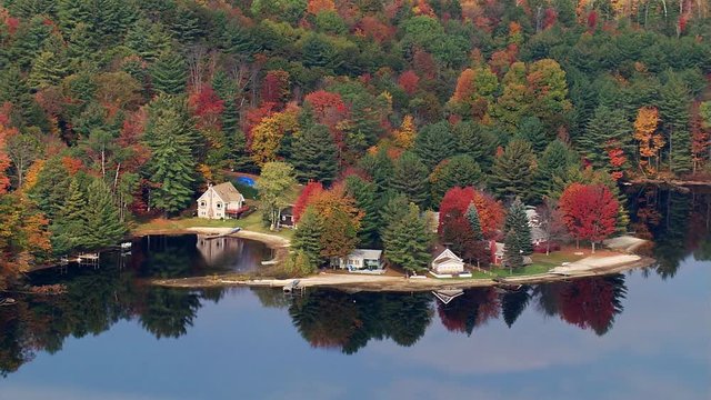 Flying past lakeside homes in New Hampshire