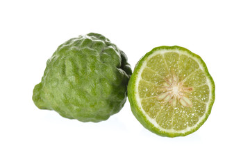 whole and half cut Bergamot on white background