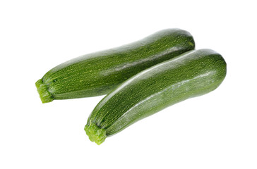 unpeeled whole fresh Zucchini on white background
