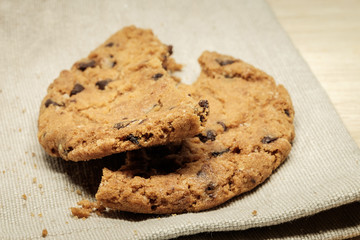 Pastry biscuits on linen napkin on wooden table