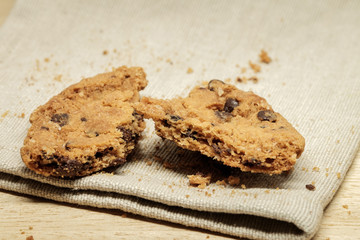 Pastry biscuits on linen napkin on wooden table