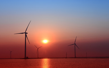 Wind power, in the sea of the sunset