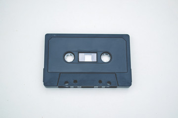 Obraz premium Old audiotape on white background