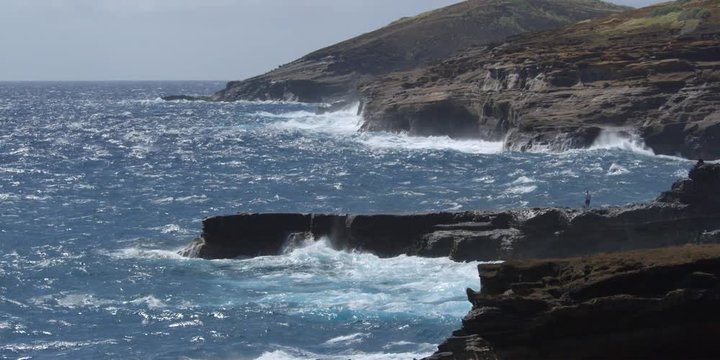 Waves washing against a Hawaiian coastline