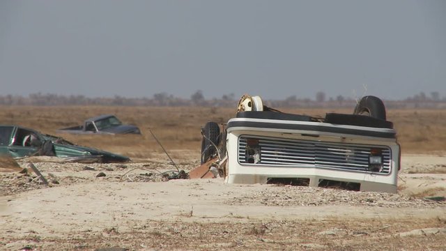 Wrecked and abandoned vehicles in wake of a hurricane
