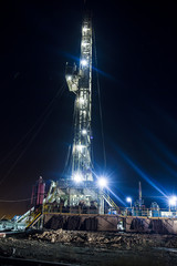 In the evening of oilfield derrick