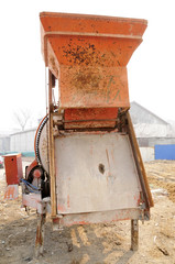 Old cement mixers in the construction site