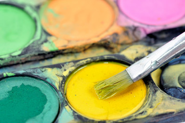 Obraz premium Watercolors and paintbrush