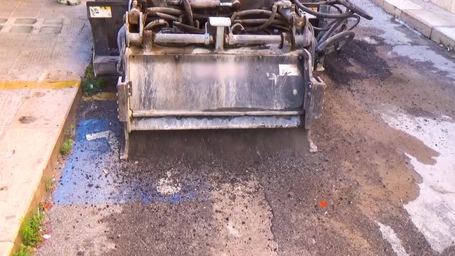 worker driver Skid steer remove Worn Asphalt during repairing Road Works