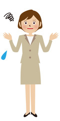 ベージュのスーツの女性　悩む