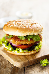 Chicken burger with cilantro and vegetables