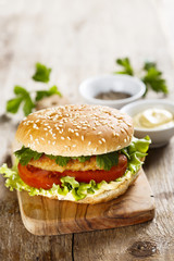 Chicken burger with cilantro and vegetables