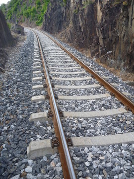 railwai track between steep rocks