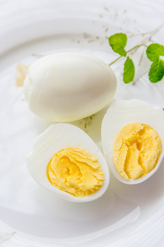 Hard boiled eggs whole and sliced.