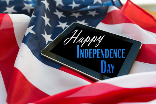 happy independence day on tablet pc american flag