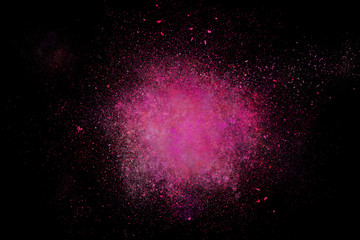 Colourful abstract powder explosion on a black background
