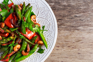 Shrimp and Asparagus stir fry food on white plate