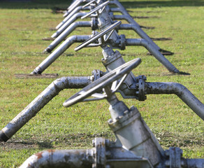 gate valves to close or open the natural gas flow from the stora