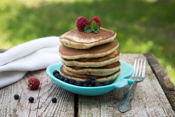 Delicious pancakes close up, with fresh berries