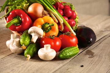 Fresh vegetables on a clean wooden table