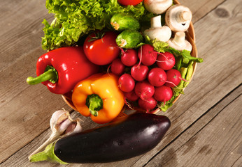 Fresh vegetables on a clean wooden table