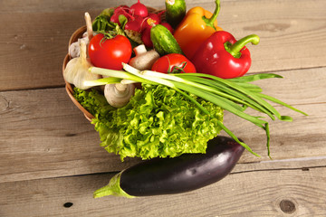 Fresh vegetables on a clean wooden table