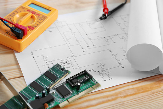 Electrical drawings with tools closeup
