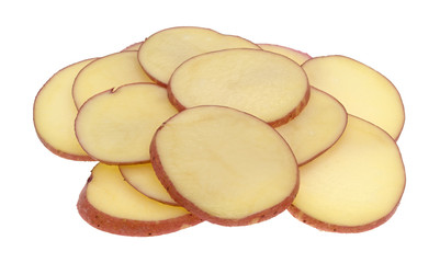 Slices of red potatoes on a white background.