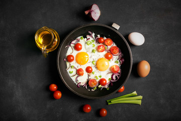 Fried eggs with vegetables