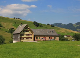 Fototapeta na wymiar Old house with shed in Appenzell Canton
