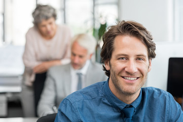 Young business man smiling