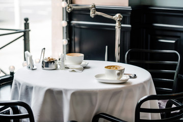 cup of coffee on table in cafe