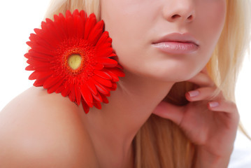 face of woman and flower