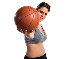 Sport woman playing basketball