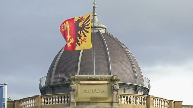 Geneva flag on Musee Ariana roof, Swiss Museum of Ceramics and Glass, slow-mo