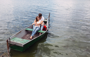 Fototapeta na wymiar Couple in boat