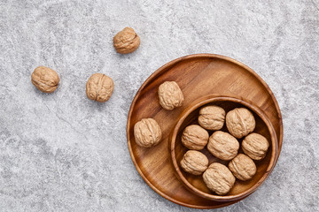 walnuts on rustic background. Walnuts kernels and nutcracker. fr