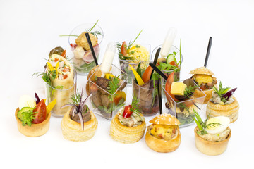 Mini Canape with meat and vegetables in plastic cups