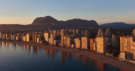 Obraz premium Aerial view of a Benidorm city coastline at sunset. Spain