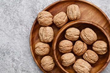 walnuts on rustic background. Walnuts kernels and nutcracker. fr