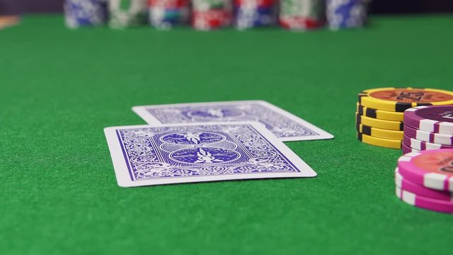 POKER: Dealer deals a cards to players