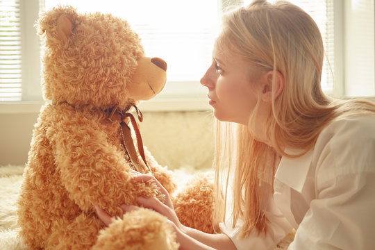 Girl With Teddy Bear