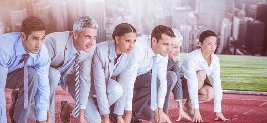 Composite image of business people preparing to run  - Powered by Adobe