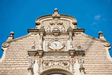 Fototapeta na wymiar Clock on the Montserrat monastery