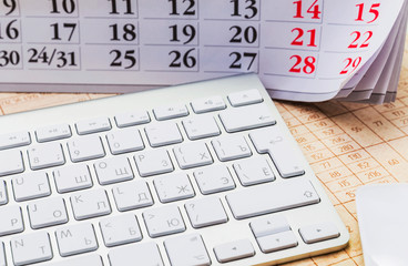Pens, calendars and computer keyboard