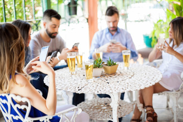 Using smartphones during a friend reunion
