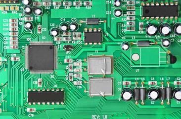Close up of a printed green computer circuit board