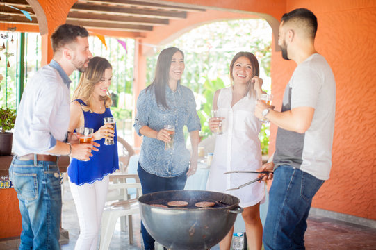 Group of friends having fun at the barbecue